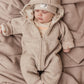 Wollwalkoverall Walkoverall in Beige mit verschiedenen Innenstoffen.