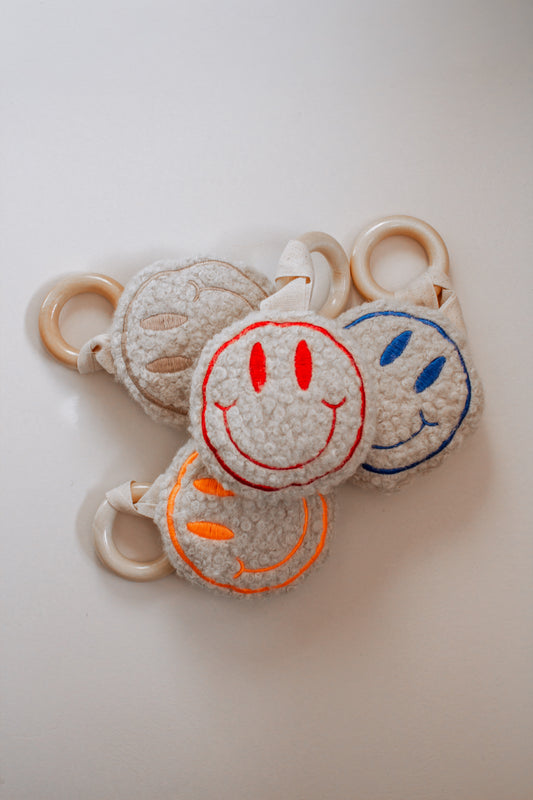 Smiley Rassel mit Holz Greifring