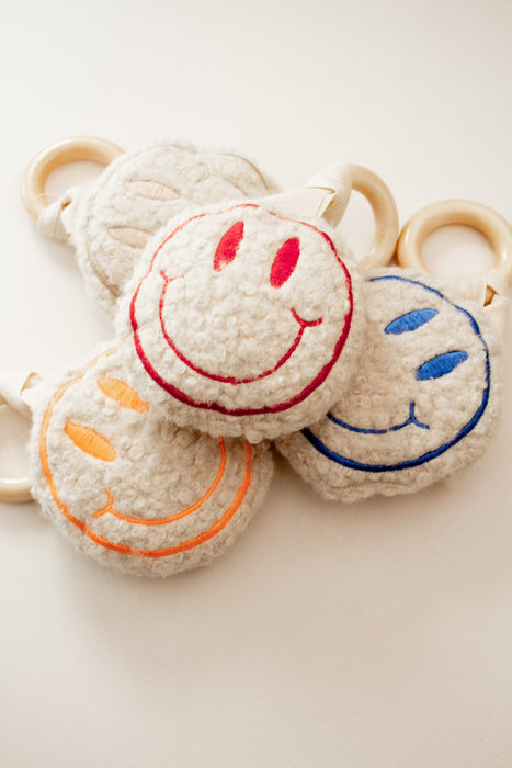 Smiley Rassel mit Holz Greifring